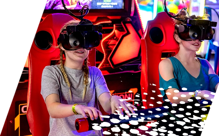 image of two girls playing virtual reality video games