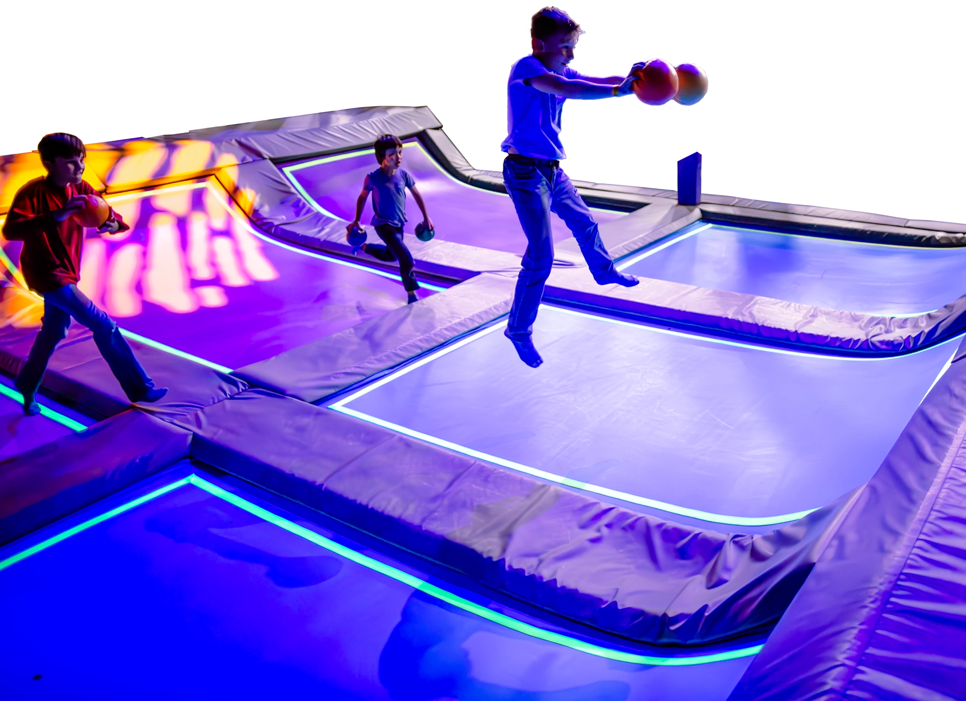 photo of kids playing dodgeball while bouncing on trampolines